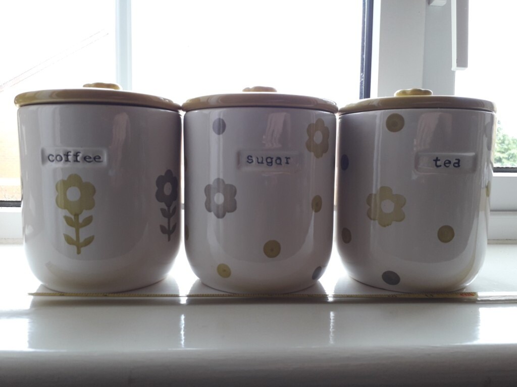 next tea coffee and sugar canisters